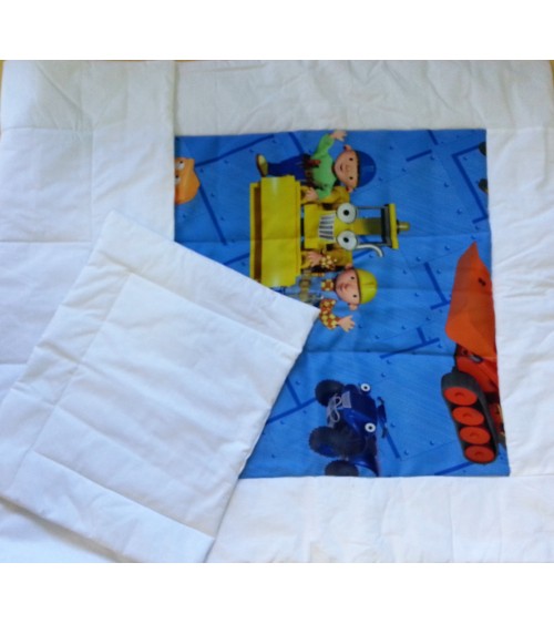 Blue figured baby quilt with pillow