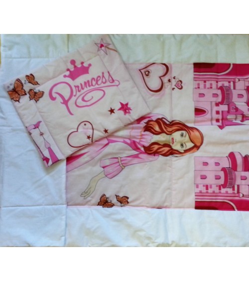 Pink figured child quilt with pillow
