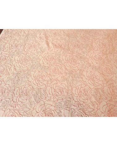 Powder colored rose figured textile